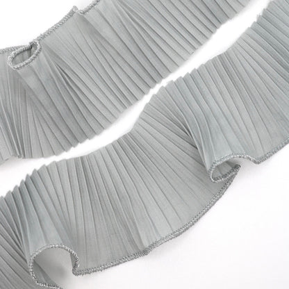Tira plisada gris borde plateado