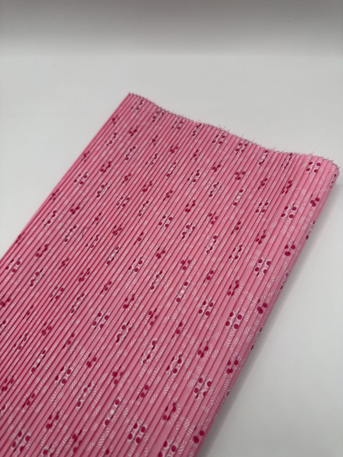 Pieza plisada rosa chicle